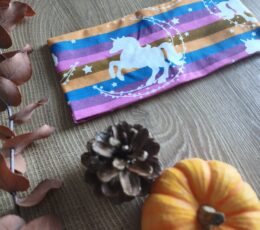 Otroški trak za ušesa - pisan z motiovm samorogov